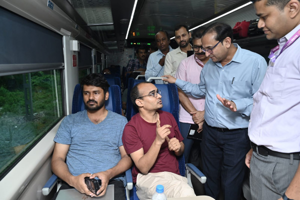 NFR GM interacts with passengers of Vande Bharat Express 