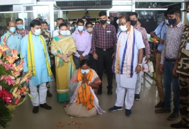 Pratima Bhowmik bows down as she arrives in home state